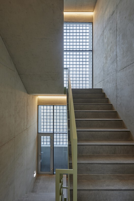 Collective mirror office building / SEED house - Interior photo, stairs, handrails